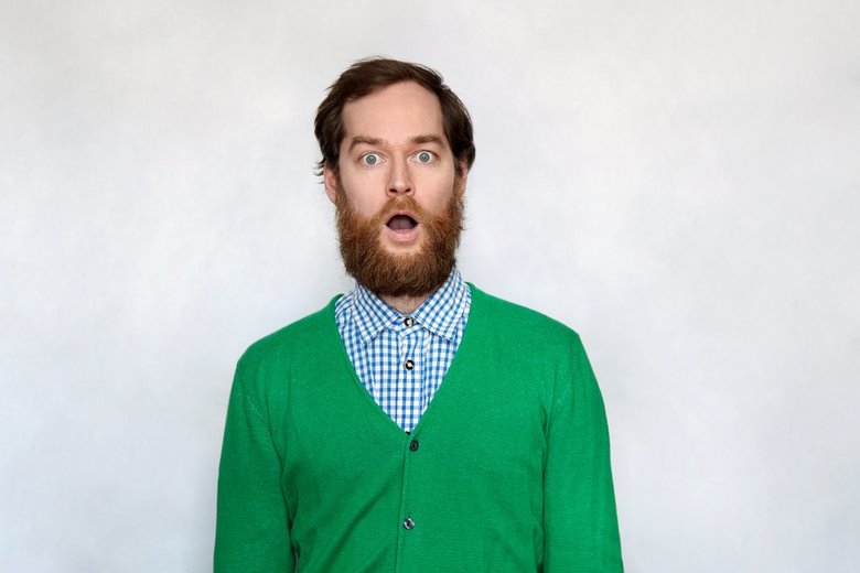 Shocked bearded man with open mouth