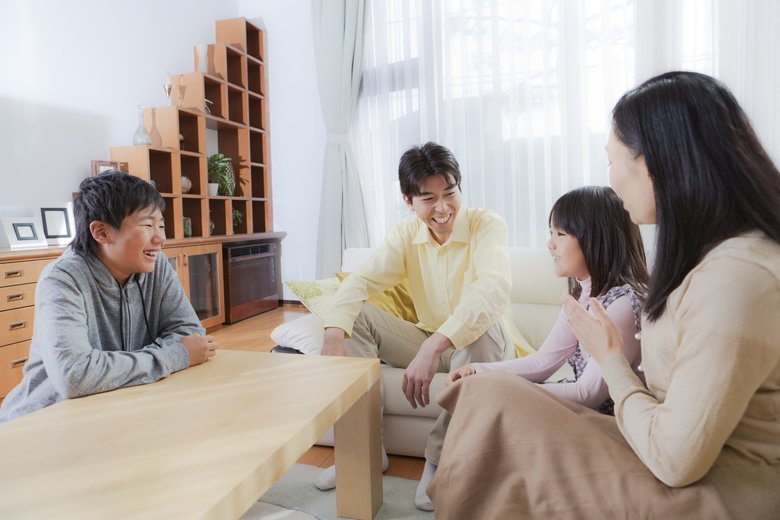 Japanese Family in Home Interior Living Room Hz