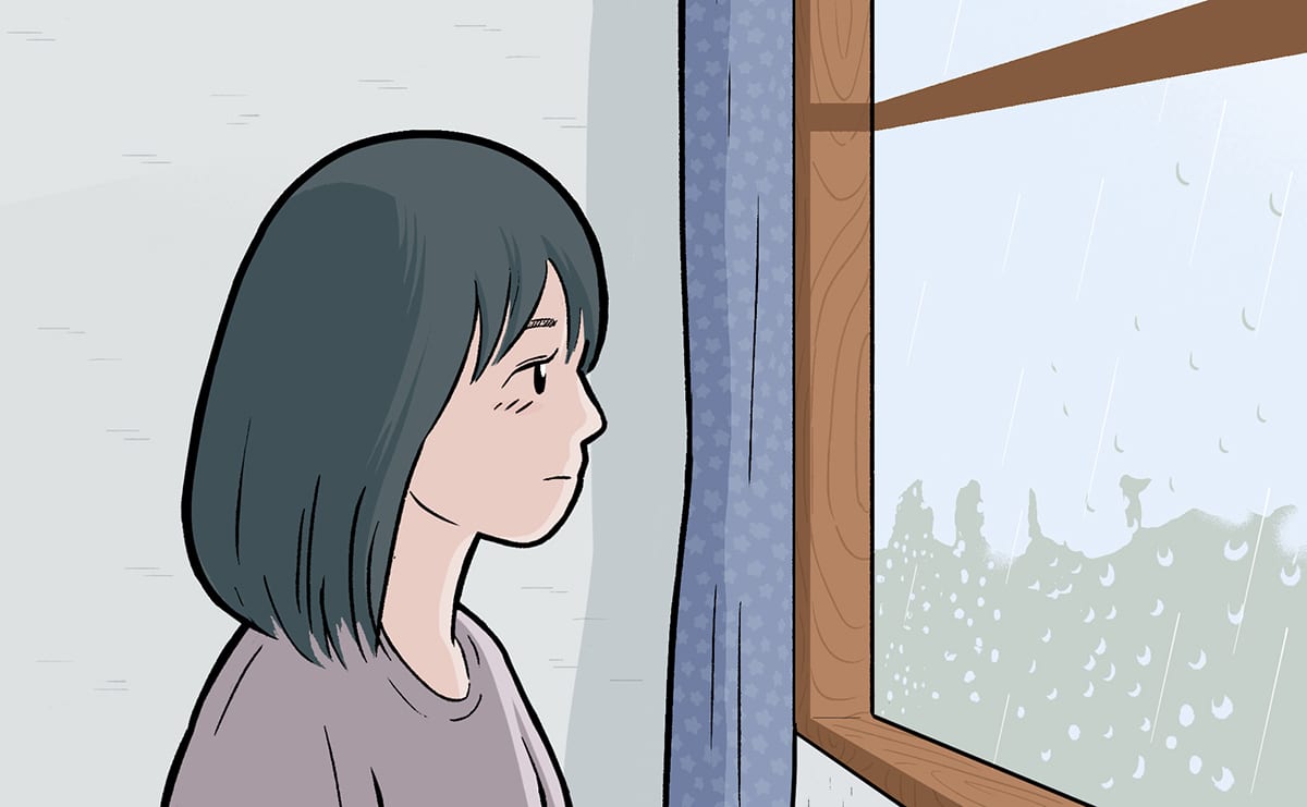 ぼんやり外を見つめる女の子