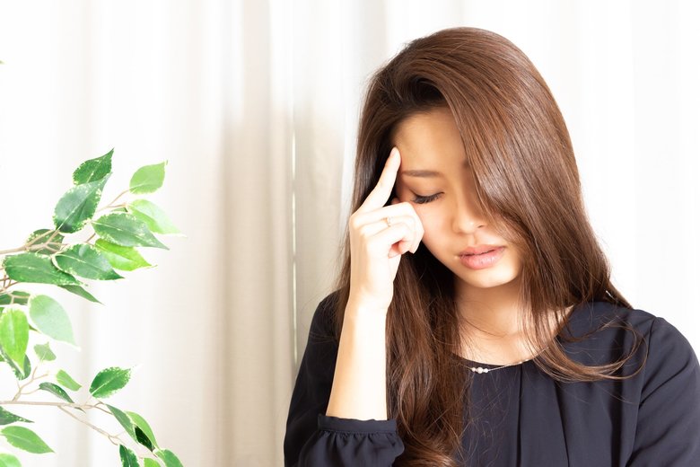 Young woman has headache