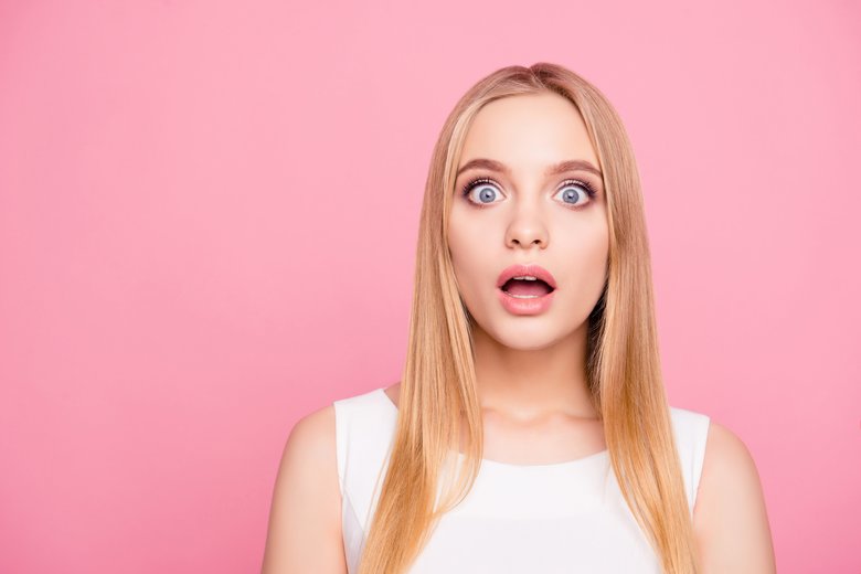 Black Friday concept! Close up portrait of charming crazy mad astonished amazed excited cheerful joyful with big gray eyes plump natural lips with pink pomade on them isolated on pink background