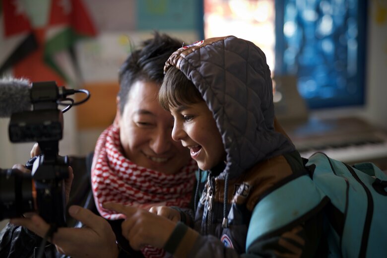 独立後、ヨルダンのシリア難民キャンプで取材をする堀さん（写真：Orangeparfait）