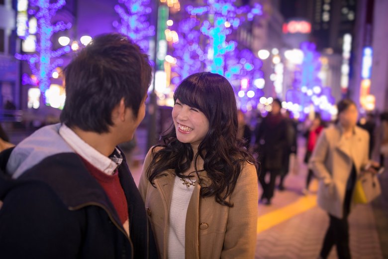 Teenager couple dating at Christmas night