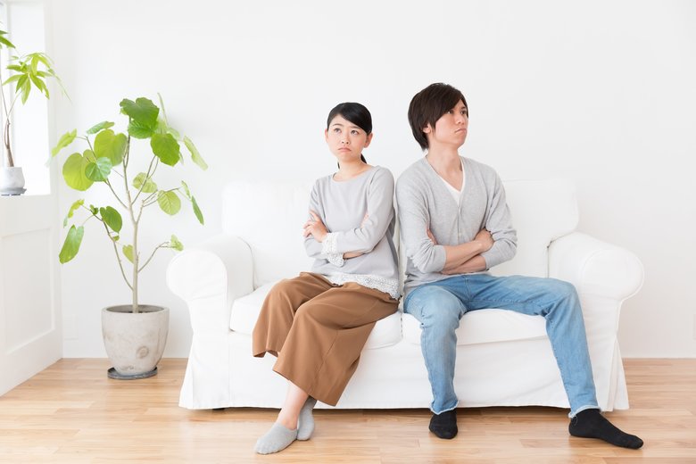 young asian couple in living room lifestyle image