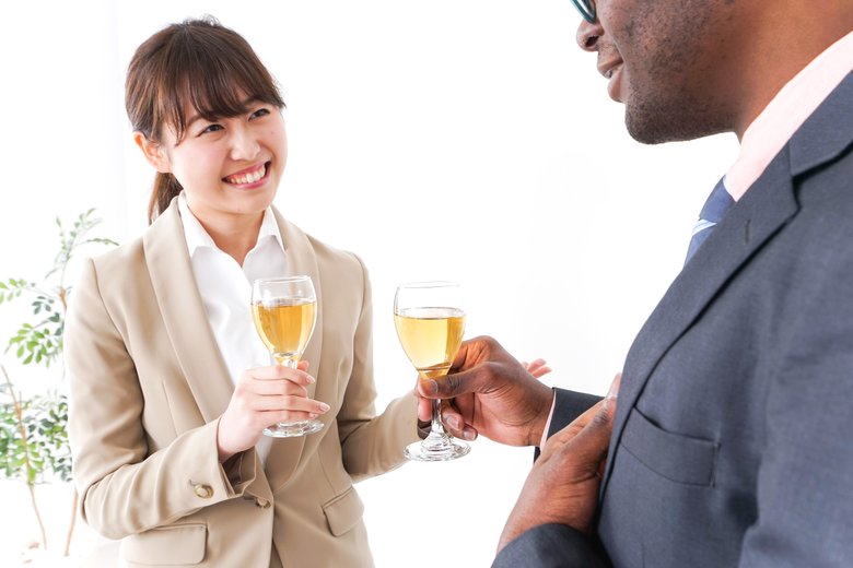 Businesspersons drinking alcohol image