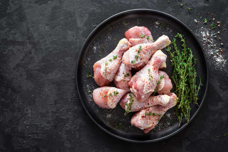 Raw marinated chicken meat, chicken legs