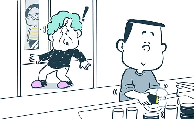 皿洗いをする男性