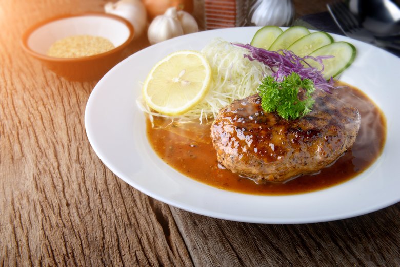 Japanese style hamberger or hamberg serve with gravy sauce.