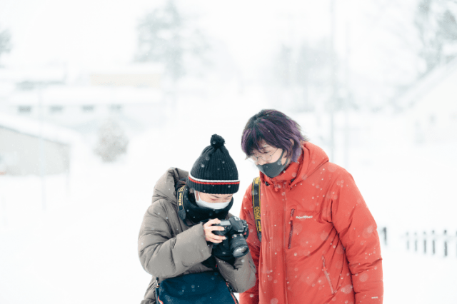 町に住むカメラマンさんから学ぶ参加者