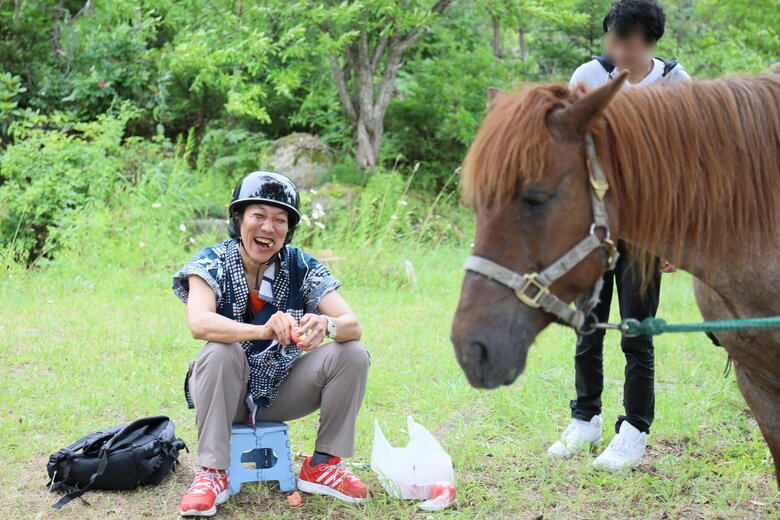 全盲の旅カメラマンとして活動する大平啓朗さん