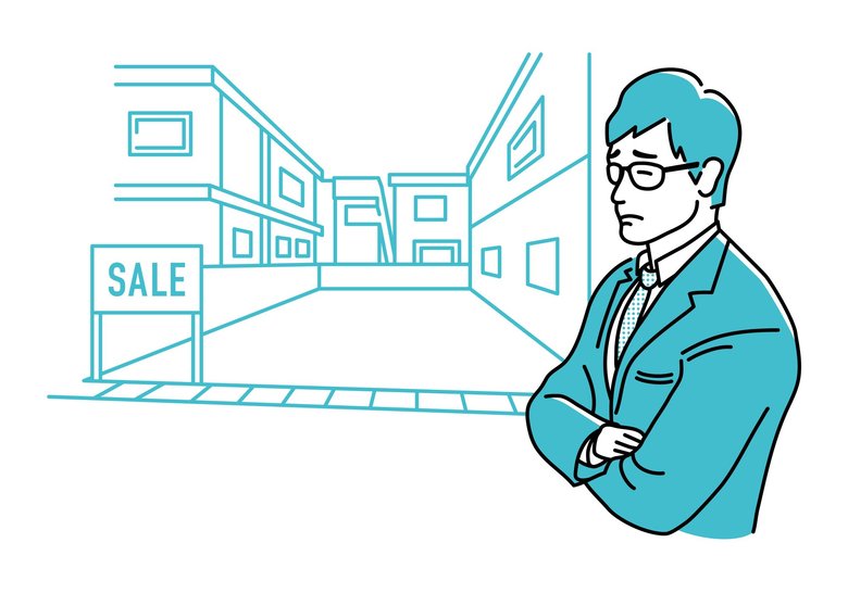 土地が売れずに困る人のイメージ（PIXTA)