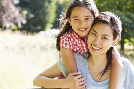 31047324 - portrait of asian mother and daughter in countryside