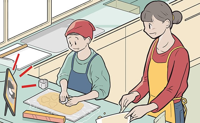 料理する親子