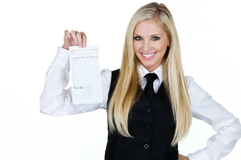 Waitress holding up a bill