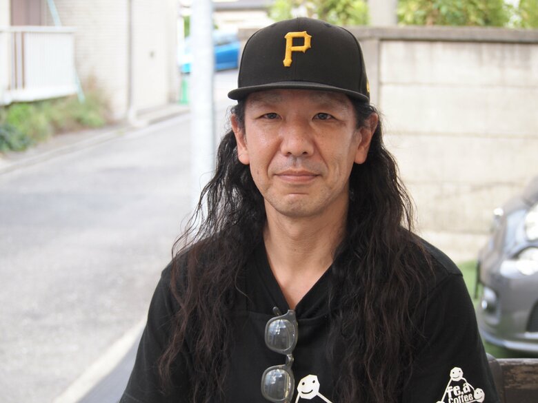 話をする関さん