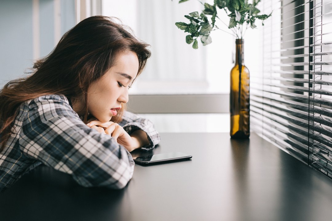 Woman waiting for text
