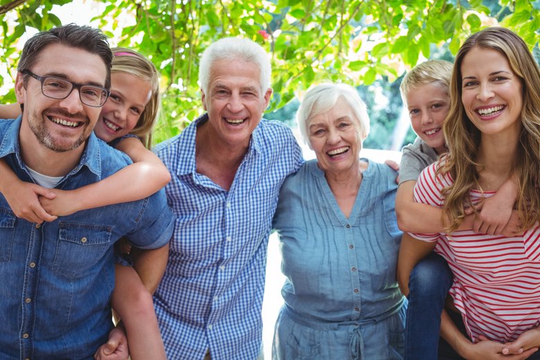 Portrait of smiling family with grandparents