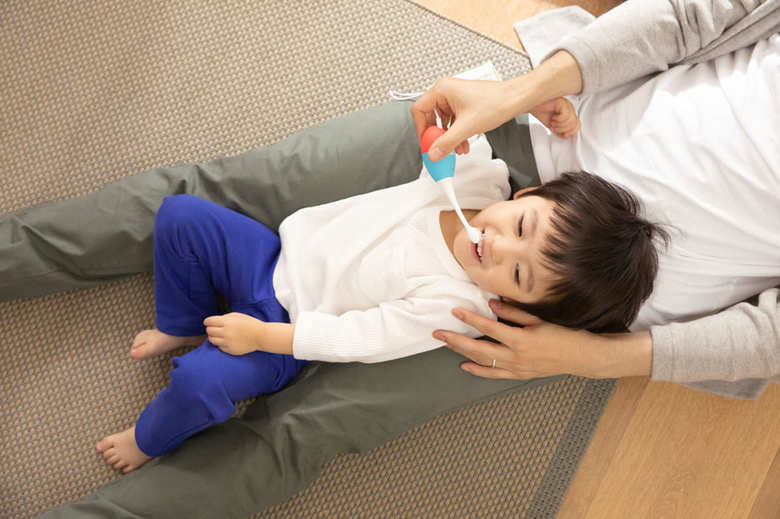 ▲子どもが音楽を聴くために口を開けてくれるので、歯磨きがしやすくなる。