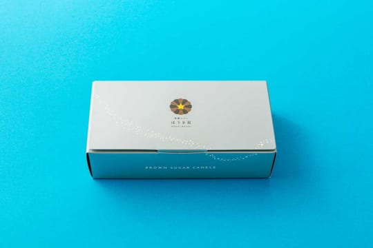 黒糖カヌレ／ほうき星