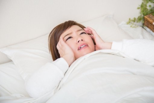 ストレスで眠れない主婦の画像