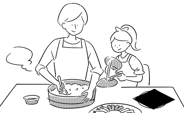 手巻き寿司を作る親子