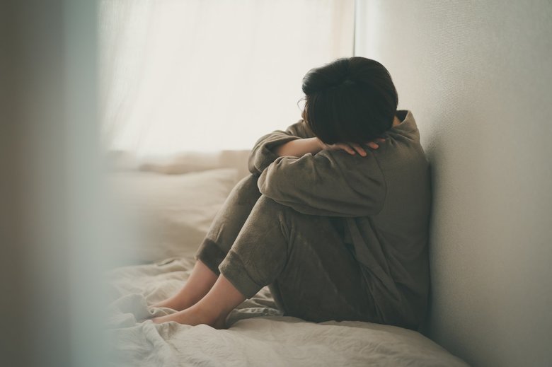 うつ状態の人のイメージ写真