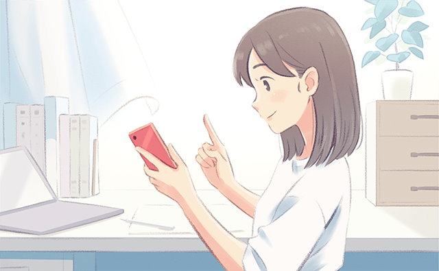 iphoneを使う女性