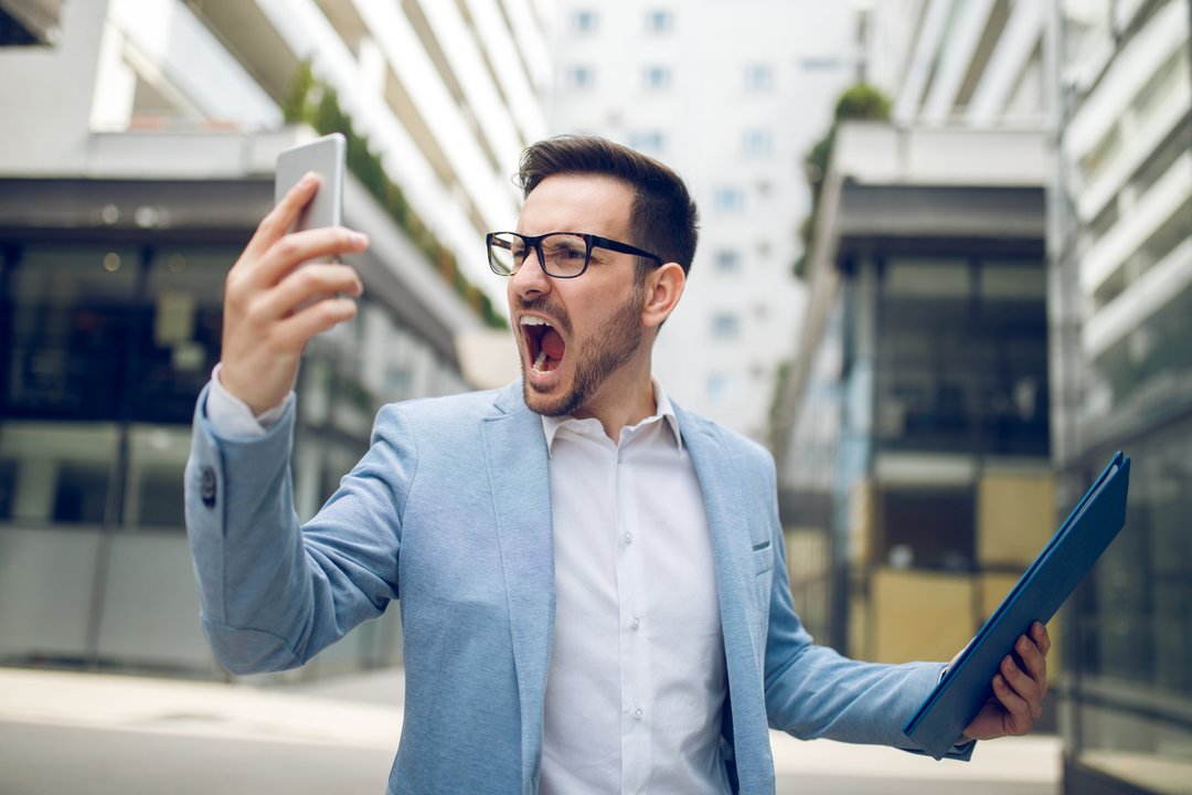 Businessman on the phone shouting