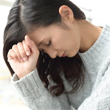 夫婦関係に悩む女性の画像