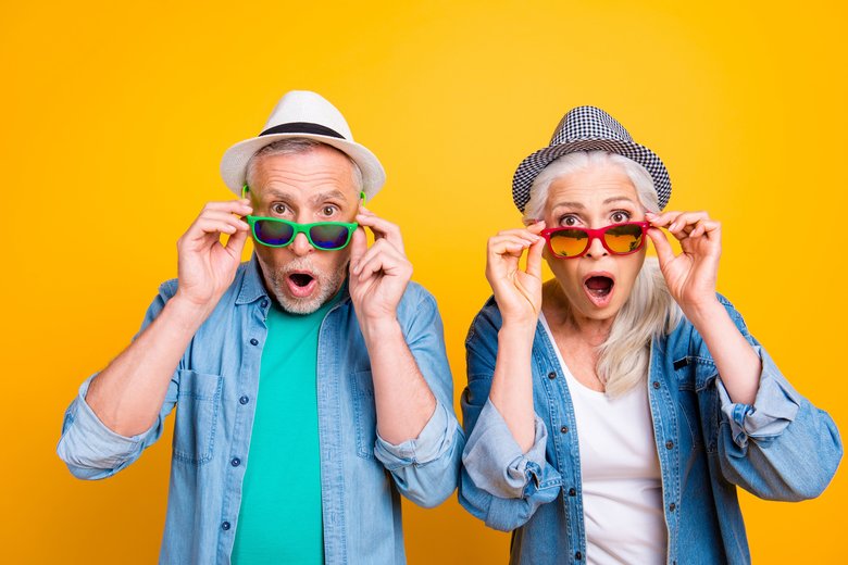 Wow unbelievable! Success win winner victory facial expressing hipster concept. Close up photo portrait of two excited astonished scared beautiful handsome people touching glasses isolated background