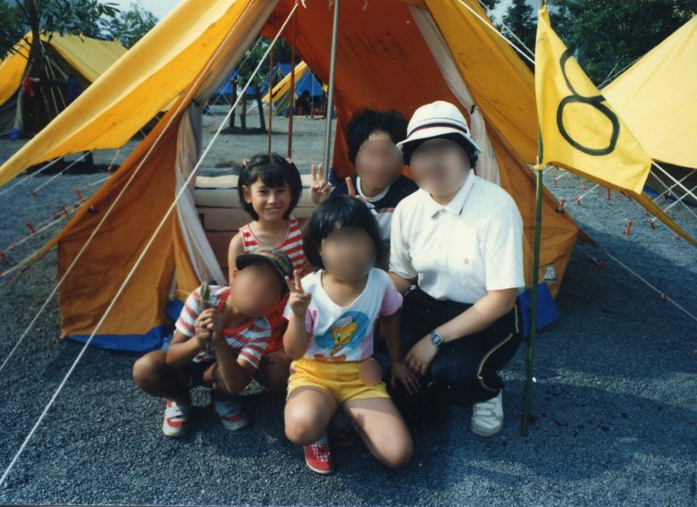 6歳のとき。学童クラブでキャンプに行ったとき。嬉しそうな笑顔の箕輪さん