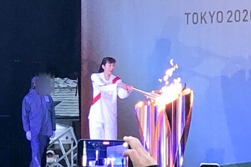 　「トーチキス」で点火した瞬間